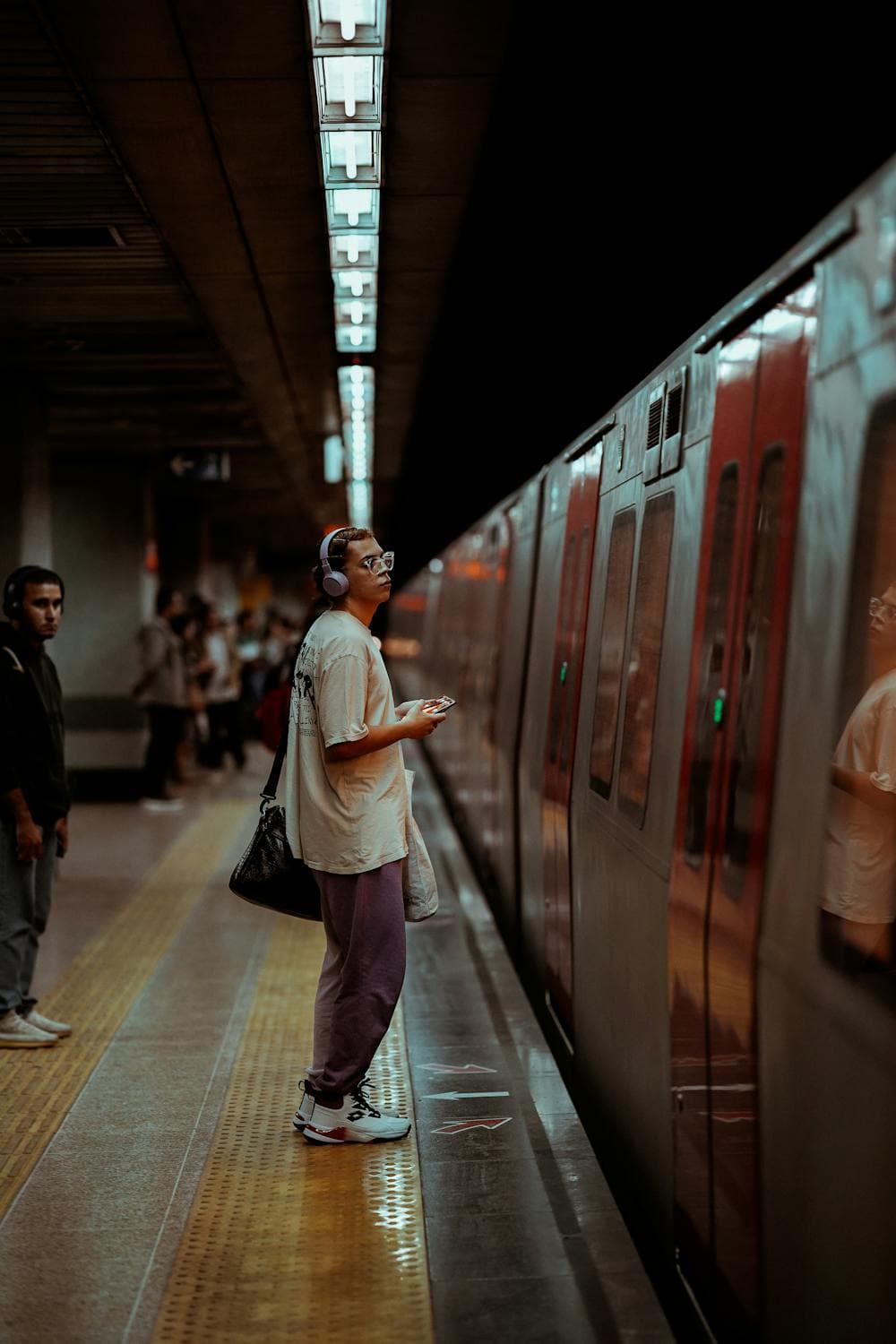 People on a subway station platform